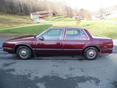 V-6  3.8 liter custom sedan