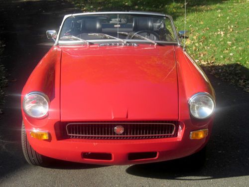 Professionally restored and customized 1977 red  mgb convertible