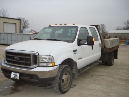 Crew cab, diesel 6.0l. 4wd, flat bed, 1 owner