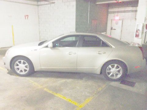 Mint condition 2009 gold cadillac cts with less than 20,000 miles