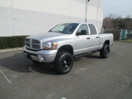 Only 15k miles 4x4 5.9 cummings diesel quad cab 4 door pick up sport