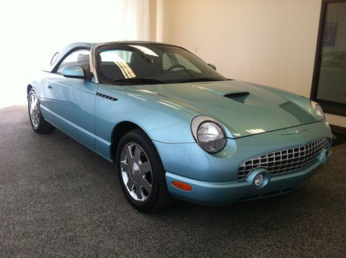 Teal hardtop convertible black leather interior very clean low mileage carfax