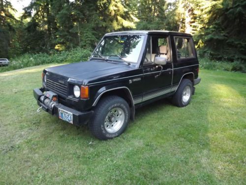 { 1988 dodge raider 4x4 / sport utility 2-door / 2.6 l / multi purpose vehicle }