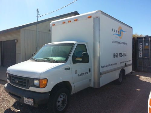 2003 ford powerstroke diesel 14&#039; box van with lift gate.