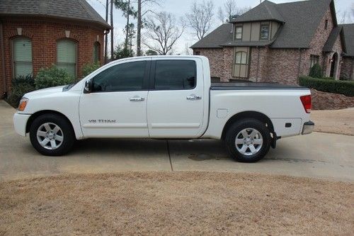 *** 2006 nissan titan le  4 door - no reserve- it will sell******