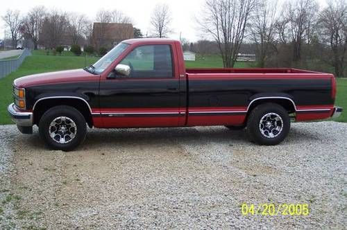 Classic 1990 chevy truck, red, black. no rust. 72k original miles, runs great