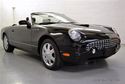 57238 miles / hard top / black metallic / leather