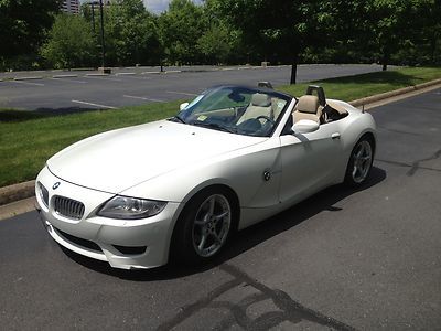 Sleek white z4, tan leather seats, six speed manual, navigation