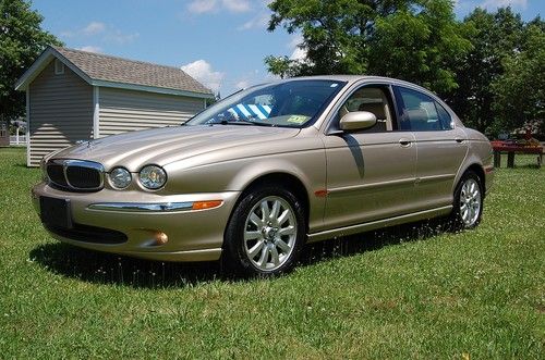 Creampuff  2003 jaguar x-type  2.5 liter, 60k original  miles, gorgeous, all w.d