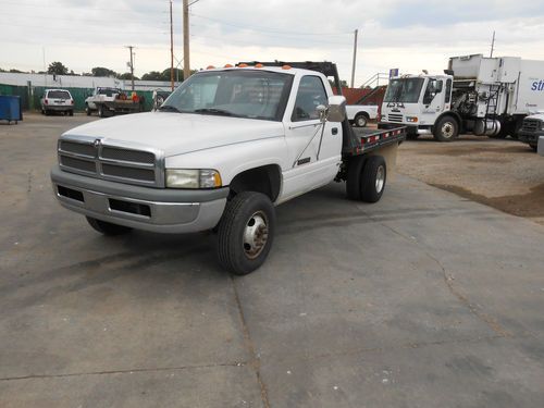 1999 dodge d3500 with flat bed, automatic, cruse control, power steering