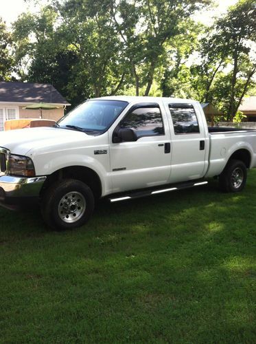 2004 ford f250 crew cab, diesel, 4x4,white, leather, xlt