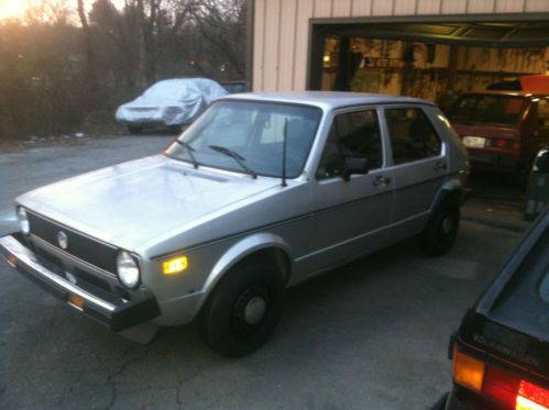 1979 vw rabbit l 4 door diesel, 4 speed, silver with black leatherette interior