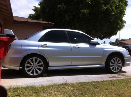 Silver, 04 sti. car engine was taken apart in december 2013.