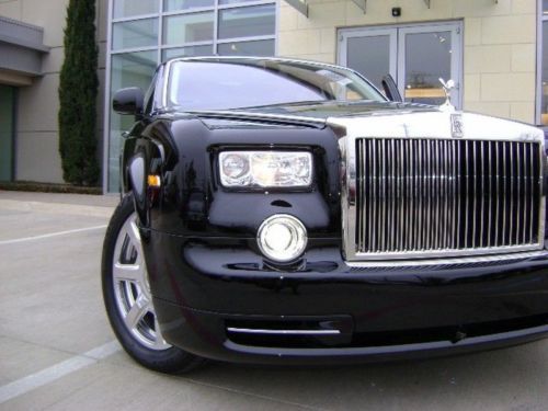 Black rolls royce phantom drives smells and looks like a new car