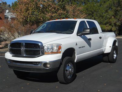 5.9 cumming diesel and its a megacab dually with a gooseneck hitch