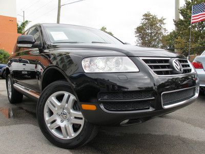 Awd touareg vw leather air suspension xenons 4x4 4.2l v8 xtra clean florida