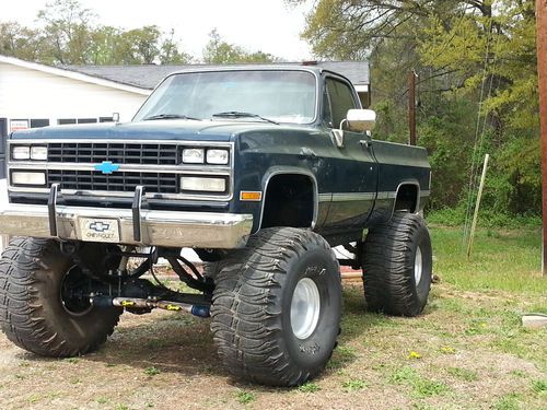 1985 lifted chevy silverado 44's  16" lift