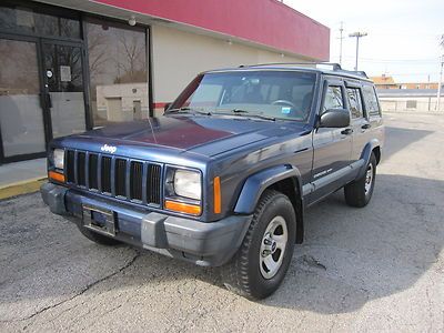 2001 jeep cherokee sport 4x4 4.0l . 4door . looks and runs great !!! 4wd