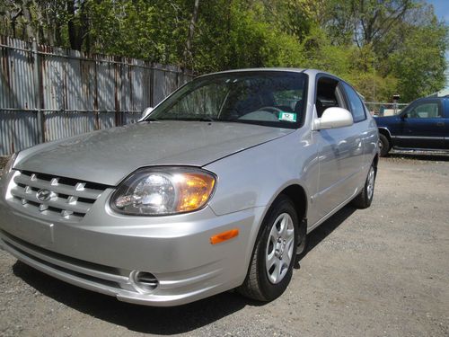 2004 hyundai accent gl hatchback ...runs great..salvage..flood..rebuildable..