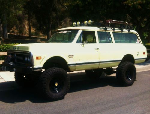 June 2013 four wheeler magazine cover truck. coolest 72 gmc suburban 4x4