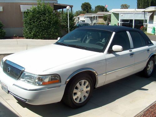 One owner:2003 mercury marquis sedan(83k miles)top of the mark/loaded w/features