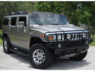 2003 hummer h2, 6.0l v8, 4x4 aut trans, fifth seat, no accidents, no reserve.