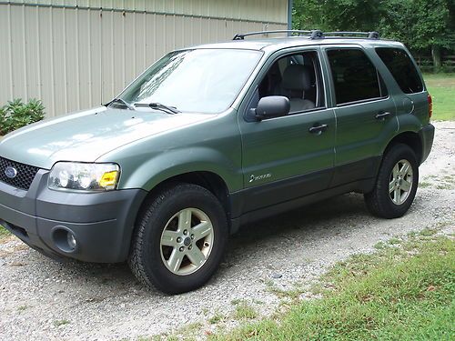 2006  escape hybrid, needs engine work,  1 owner, no rserve!!!!!!!!!!!!!!!!!!!!!