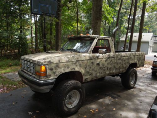 V8 swap!!! built 302!! 9&#034; lift!! 4x4, camo, newer tires, runs and drives great!