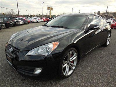 We finance! 3.8 grand touring leather roof nav 6 speed only 34k factory warranty
