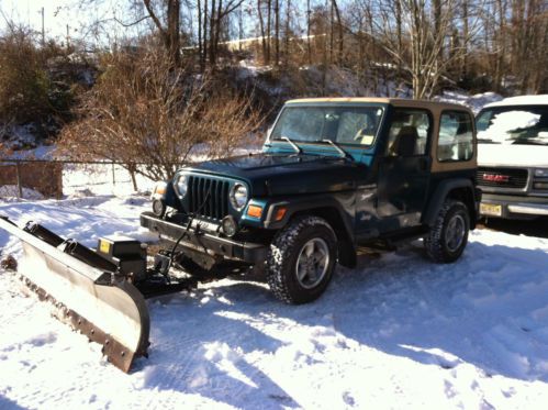 1997 jeep wrangler sport sport utility 2-door 4.0l snoway plow
