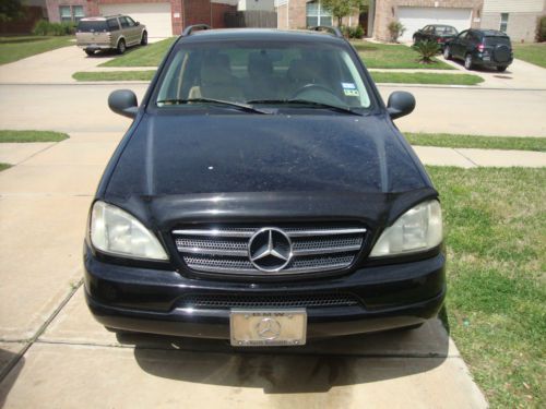 Exceptional 1999 black mercedes benz ml320...no reserved price!!!!