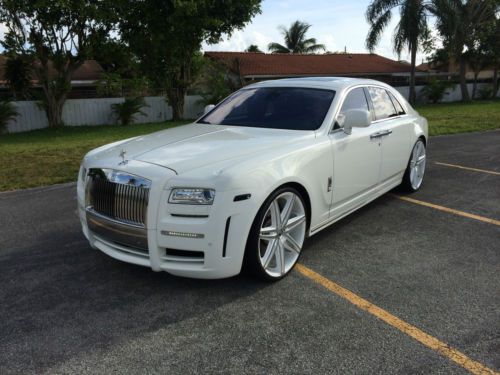 Rolls royce ghost sedan 4 door white with red interior, custom rims and body kit