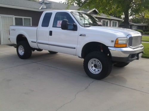 1999 4x4 ford f350 ex cab 6 speed 7.3l diesel low miles