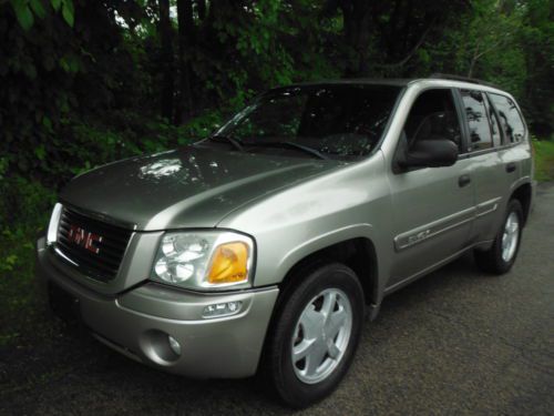 2003 gmc envoy 4 door 4x4 4.2 liter 6 cylinder with air conditioning