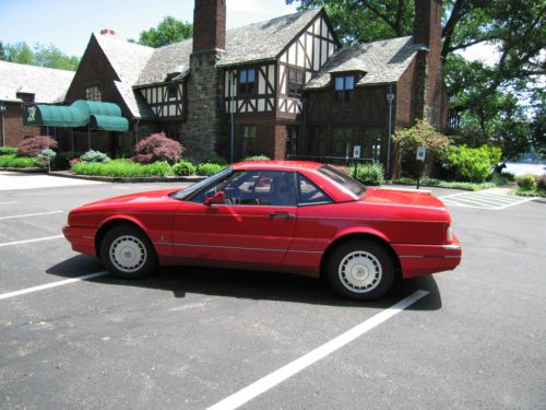 Red exterior, tan leather interior, 2 door coupe with soft top &amp; hard top