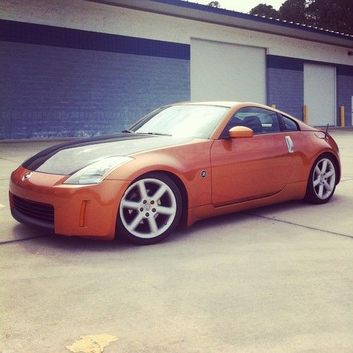 2003 nissan 350z touring coupe 2-door 3.5l 61,900 miles 6-speed manual orange