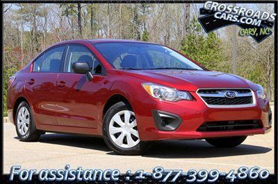 12 awd 28k factory warranty sedan 5-speed manual all weather mats cloth 4wd