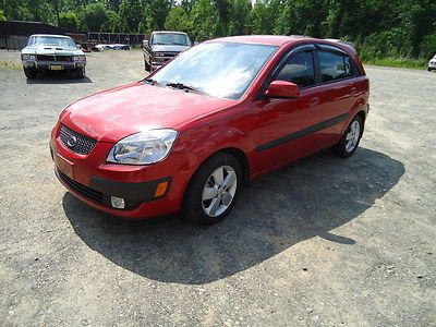 2009 kia 5sx 56,000 miles perfect