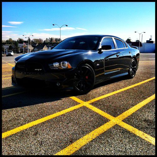 Black on black one of a kind srt8 500 hp charger" super mamba"
