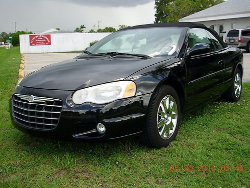 Black convertible excellent conditiion,gray leather interior