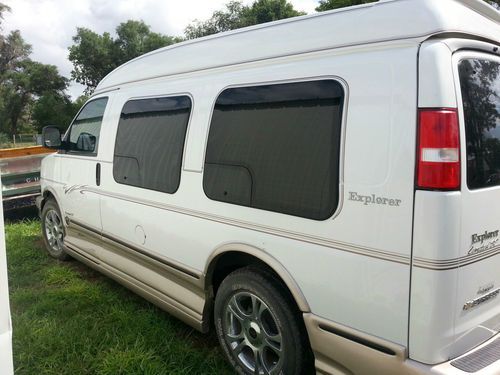 White chevrolet conversion van low miles