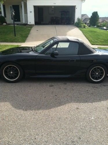 02 black mazda miata w/ low miles