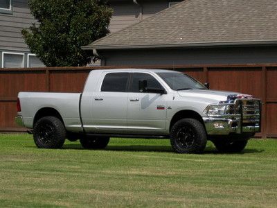 Mega cab ( leather seats ) rims! nice truck 69k