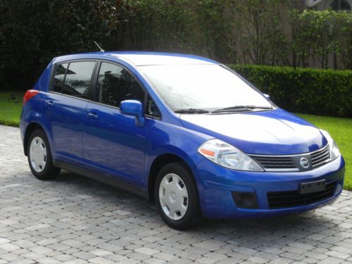 Nissan versa s 4 door hatchback low miles 1 owner garaged kept