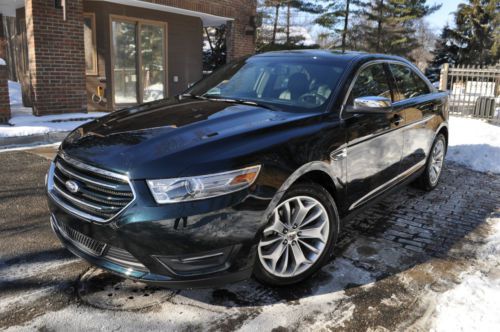 2014 taurus ltd.no reserve.leather/navi/camera/sensors/19s/sync/htd/cooled seats