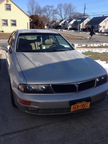 Tan mitsubishi diamante! only 81,000 miles! great condition! many years left!