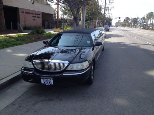 Black limo built by krystal coach 5th door 120in.