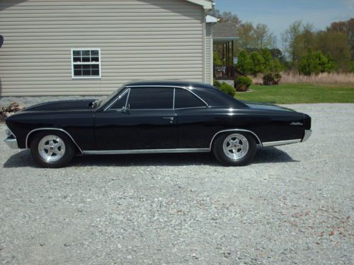 1966 black cheverolet street strip chevelle