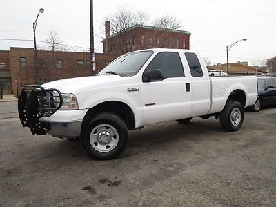 White f350xlt supercab,6.0l turbo diesel,126k miles,tow pkg,ex-govt,pw/pl,cruise