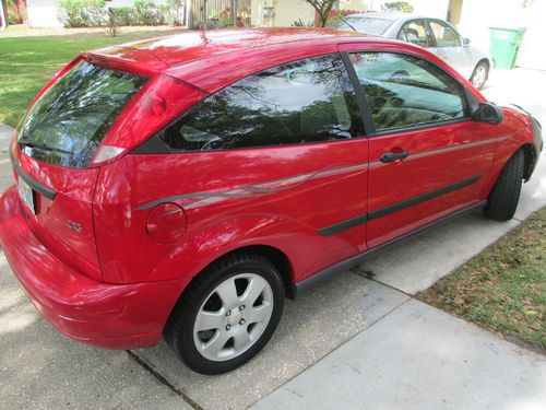 Ford focus zx3, low milage, excellent, new radio/cd, premium wheels/tires